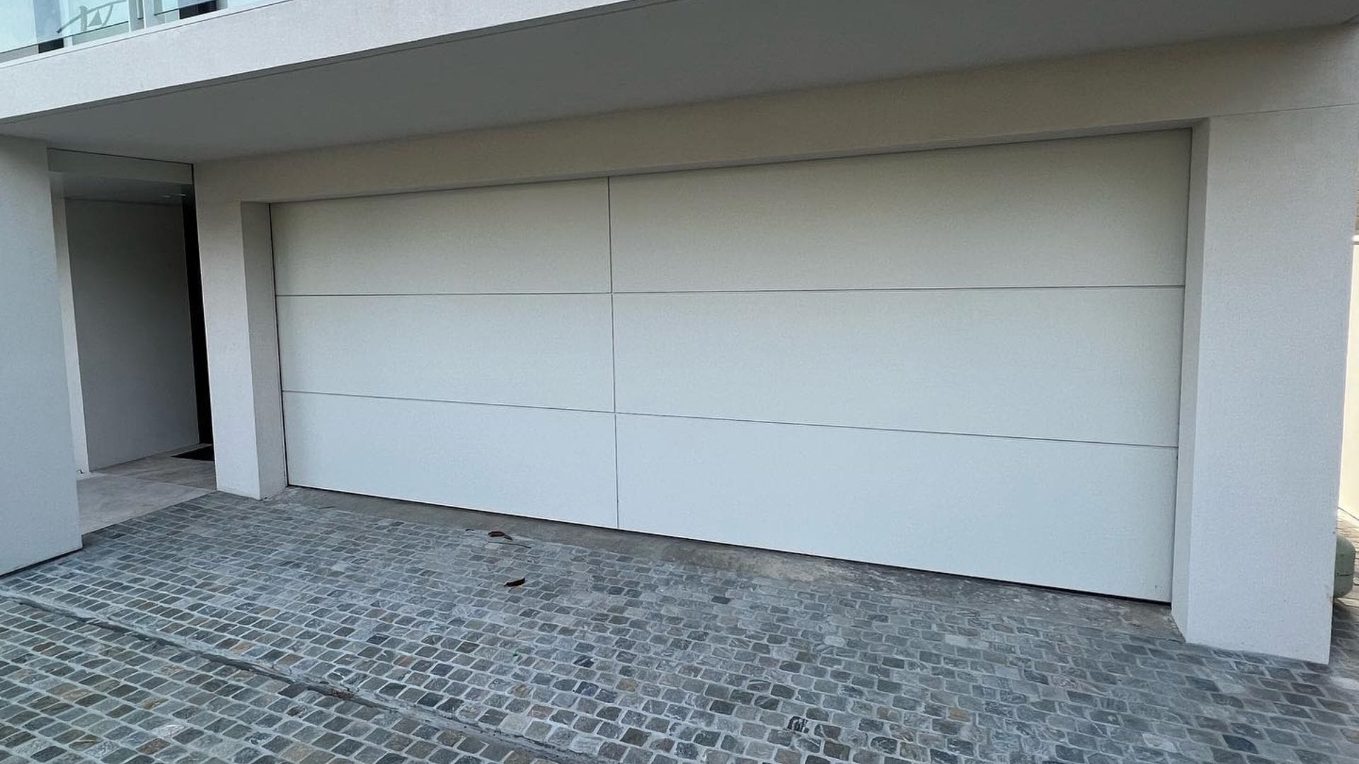 Custom white panel lift garage door