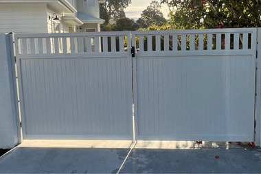 White double swing gate with a picket-style top
