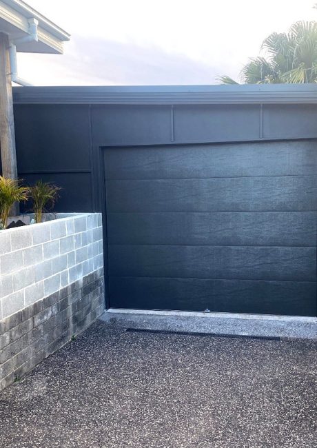 are tilt garage doors more expensive than sectional?